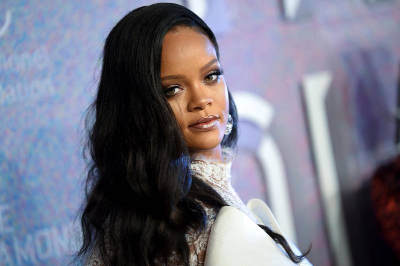 FILE - In this Sept. 13, 2018 file photo, singer Rihanna attends the 4th annual Diamond Ball at Cipriani Wall Street in New York. Rihanna is partnering with LVMH MoÃ«t Hennessy Louis Vuitton to launch a new fashion label. The pop star, born Robyn Rihanna Fenty, announced Friday, May 10, 2019, that a new line called Fenty will debut this spring and will be based in Paris.   (Photo by Evan Agostini/Invision/AP, File)