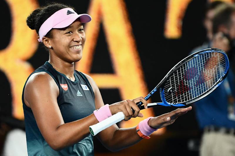Japan's Naomi Osaka celebrates her victory against Czech Republic's Petra Kvitova during the women's singles final on day 13 of the Australian Open tennis tournament in Melbourne on January 26, 2019. (Photo by Jewel SAMAD / AFP) / -- IMAGE RESTRICTED TO EDITORIAL USE - STRICTLY NO COMMERCIAL USE --