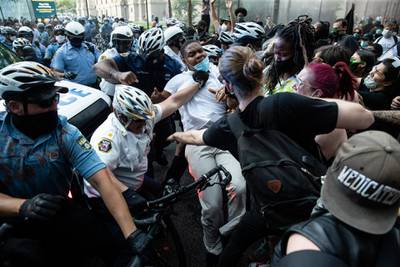 Police and protesters clash in Philadelphia, during a demonstration over the death of George Floyd. AP Photo