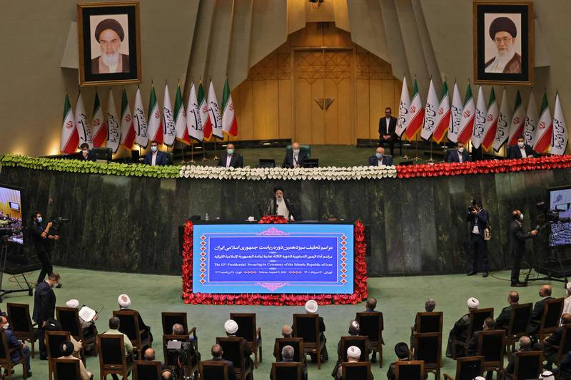 Iran's newly elected President Ebrahim Raisi (centre) speaks at his swearing in ceremony at the Iranian parliament in the capital Tehran.