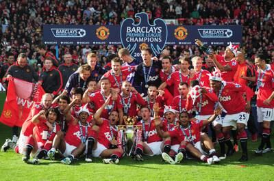 United celebrate with the Premier League trophy in 2010-11, when they won with 80 points. Getty