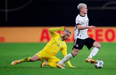 Germany defender Philipp Max dribbles the ball away from Ukraine midfielder Marlos. AFP