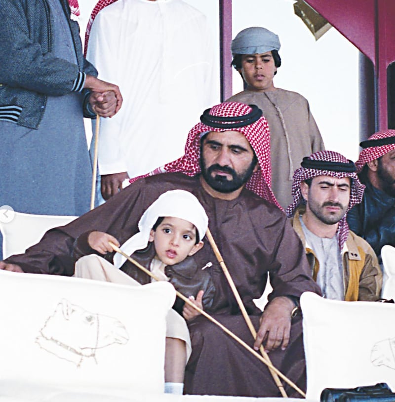 Sheikh Mohammed and Sheikh Hamdan watch the camel racing.