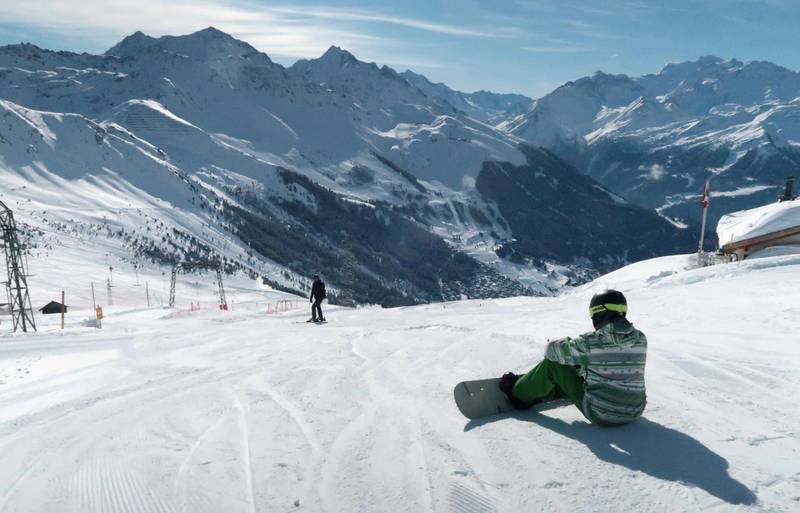 VERBIER, SWITZERLAND - MARCH 1: A snowboarder prepares to descend a piste at the ski resort of Verbier on March 1, 2020 at Verbier, Switzerland. Verbier is among Swiss ski resorts that are reportedly closing immediately as of March 13 due to fears over the ongoing spread of the coronavirus. (Photo by Sean Gallup/Getty Images)