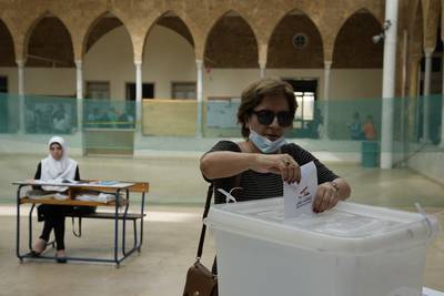 A woman votes in Lebanon's parliamentary elections in Beirut. AP