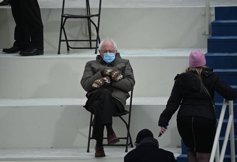 Former presidential candidate, Senator Bernie Sanders (D-Vermont) sits in the bleachers on Capitol Hill before Joe Biden is sworn in as the 46th US President on January 20, 2021, at the US Capitol in Washington, DC. / AFP / Brendan SMIALOWSKI
