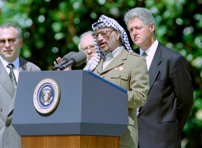 Then Palestine Liberation Organisation chairman Yasser Arafat, flanked by Israeli prime minister Yitzhak Rabin and US president Bill Clinton. AFP
