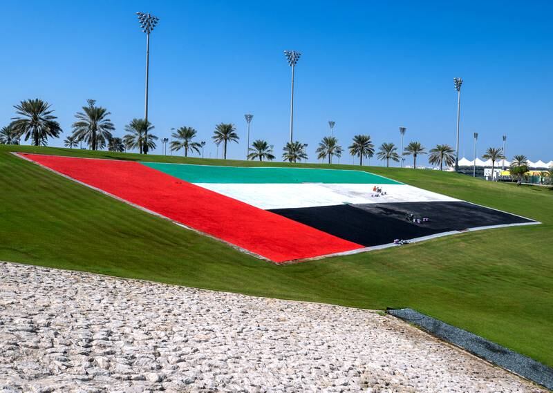 The UAE flag adorns Abu Dhabi Hill at the circuit. Victor Besa / The National