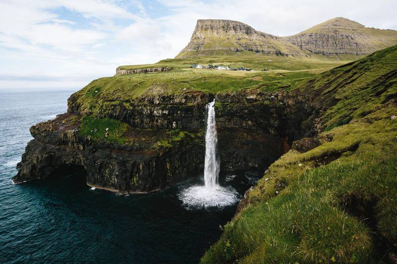 Mulafossur, one of the prettiest waterfalls in the world, is in Gasadalur on the Faroe Islands. Unsplash 