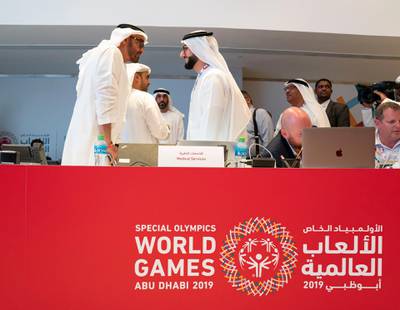 ABU DHABI, UNITED ARAB EMIRATES - March 20, 2019: HH Sheikh Mohamed bin Zayed Al Nahyan, Crown Prince of Abu Dhabi and Deputy Supreme Commander of the UAE Armed Forces (L) tours Special Olympics World Games Abu Dhabi 2019 at Abu Dhabi National Exhibition Centre. 

( Mohamed Al Hammadi / Ministry of Presidential Affairs )
---