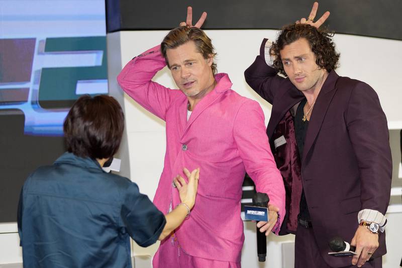 Actors Brad Pitt and Aaron Taylor-Johnson promote their latest movie 'Bullet Train' in Seoul. AP
