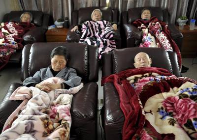 Other Asian societies, such as in China, find ageing to be a challenge. Elderly people take a nap at a day care centre in Shanghai. Nursing homes are not an option for most Chinese. The few nursing homes in China supply only 22 beds for every 1,000 seniors, and most are too expensive for the average family. AP Photo