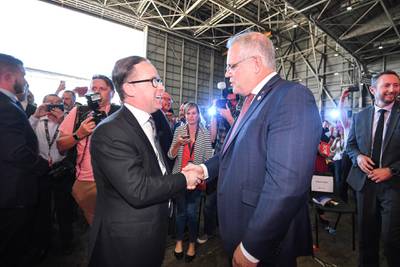 Australian Prime Minister Scott Morrison, right, congratulates Qantas chief executive Alan Joyce. EPA