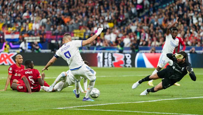 Karim Benzema scores for Real Madrid late in the first half but the goal was ruled out by VAR for offside. PA