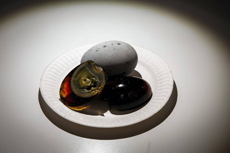<p>Century egg from China: duck or quail eggs are preserved for a few months in a solution that uses clay, ash or quicklime&nbsp;and salt. Consequently, the yolk becomes grey, with a cheese-like texture, and the whites turn into a dark jelly.&nbsp;Photo by Anja Barte Telin&nbsp;&nbsp;&nbsp;</p>
