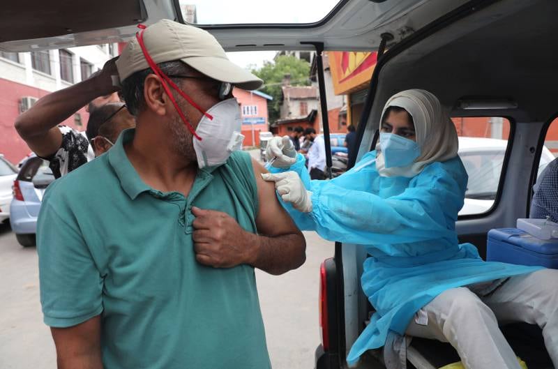 A man receives a Covid-19 vaccine shot in Srinagar, the summer capital of Indian Kashmir.
