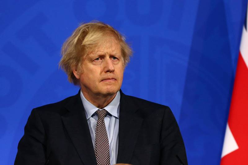 Britain's Prime Minister Boris Johnson holds a news conference on the coronavirus disease (COVID-19) pandemic, in London, Britain March 29, 2021. Hollie Adams/Pool via REUTERS