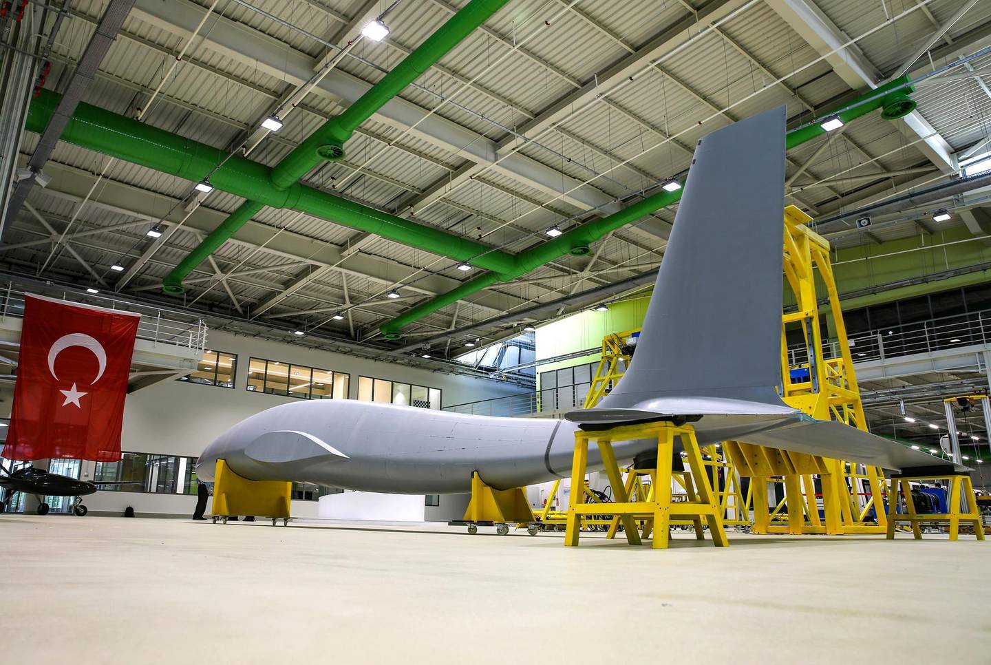 ISTANBUL, TURKEY - JUNE 13: The new heavy armed unmanned aerial vehicle (UAV), called combat drone 'Akinci' developed by Turkish unmanned aircraft producer Baykar Makina is seen on June 13, 2018 in Istanbul, Turkey. It is expected that Akinci will start to fly in the beginning of 2019. 
 (Photo by Salih Zeki Fazlioglu/Anadolu Agency/Getty Images)