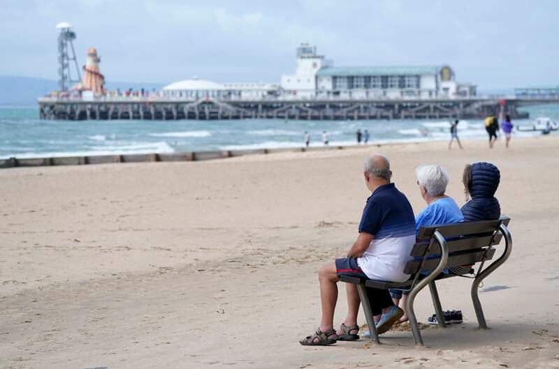 People on Bournemouth beach in Dorset this summer. PA
