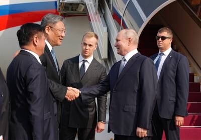 Russian President Vladimir Putin, second from right, arrives in Beijing, where he will attend the third Belt and Road Forum.   EPA 