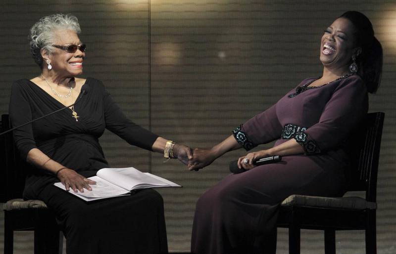 Oprah Winfrey, right, laughs with poet Maya Angelou during the taping of Oprah’s Surprise Spectacular in Chicago on May 17, 2011. John Gress / Reuters
