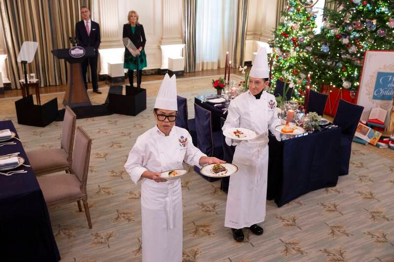 Chef Cris Comerford, left, and White House Executive Pastry Chef Susie Morrison, right, show dishes that will be offered. EPA