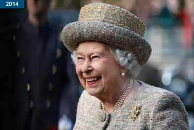 2014: A smiling queen arrives for the opening of the Flanders Fields Memorial Garden at Wellington Barracks in London.