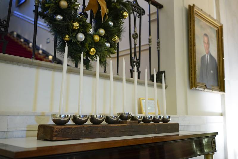 A menorah that was built by White House carpenters from wood that was removed during a Truman-era renovation is on display in the Cross Hall of the White House. AP