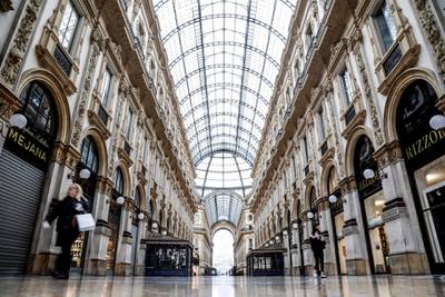 The Galleria Vittorio Emanuele II is nearly deserted with shops closed during the coronavirus emergency lockdown in Milan. EPA
