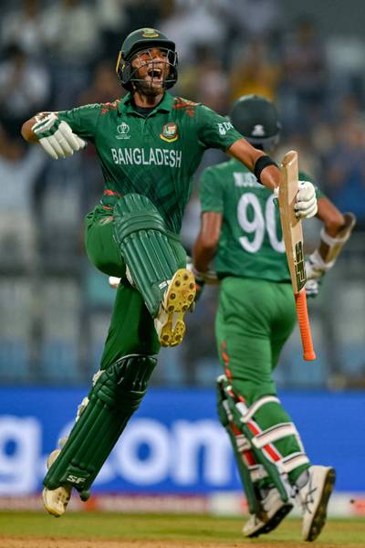 Bangladesh's Mahmudullah celebrates reaching his century against South Africa. AFP