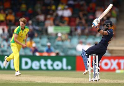 Virat Kohli of India pulls Aussie quick Cameron Green. Getty