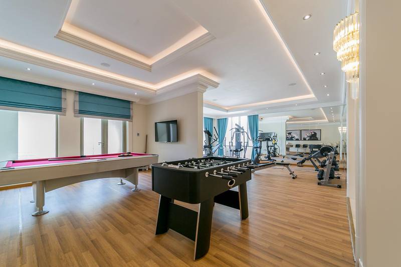 <p>Workouts in the gym can be broken up with a quick game of table football or pool.&nbsp;Courtesy LuxuryProperty.com</p>
