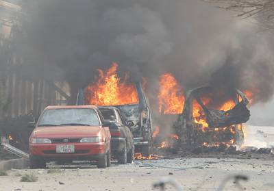 Vehicles are seen on fire after a blast in Jalalabad. Parwiz / Reuters