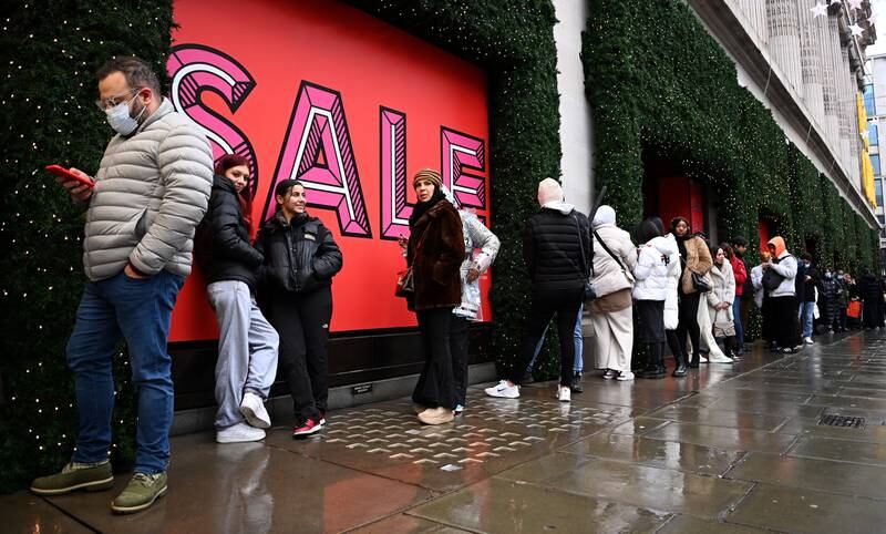 Despite scenes of people queuing outside Selfridges for Boxing Day sales on Oxford Street in London, footfall was still much lower than 2019 levels. Photo: EPA