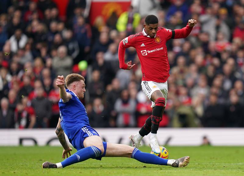 Leicester's Harry Souttar challenges Manchester United attacker Marcus Rashford. PA