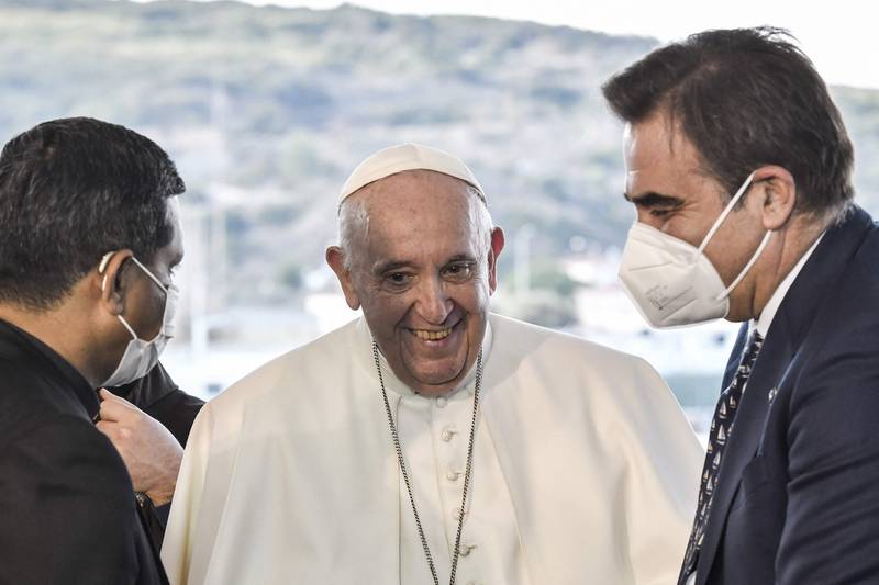 Pope Francis with European Commission Vice President Margaritis Schinas, right, on the Greek island of Lesbos. AFP