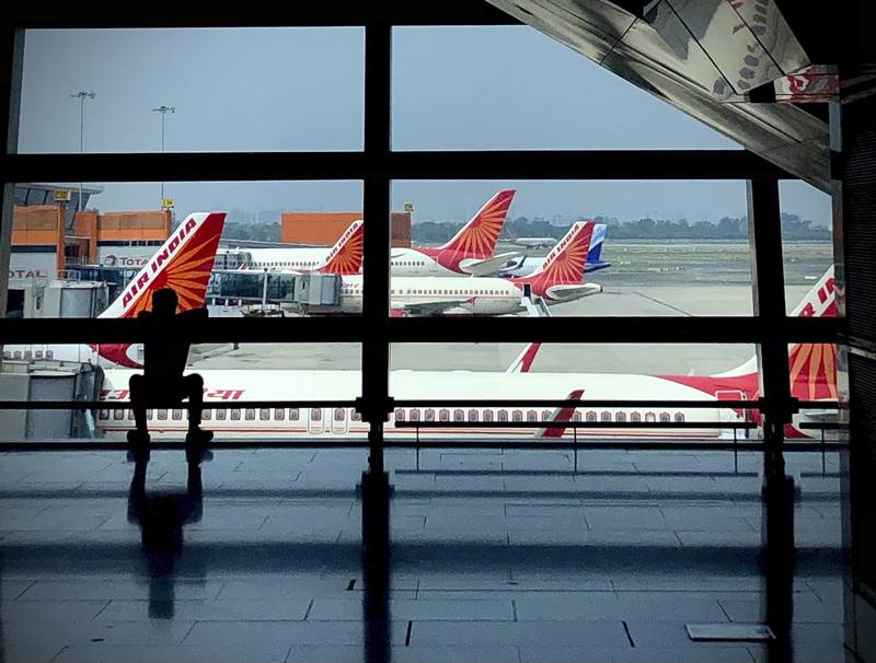 Air India planes in New Delhi. Tata Sons on Thursday regained the ownership of the country's debt-laden airline. AP