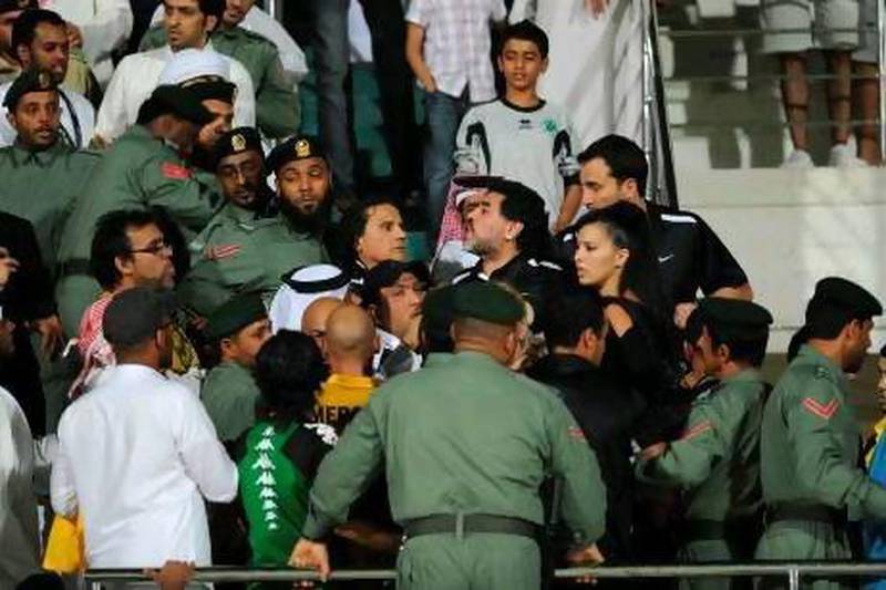 Diego Maradona, the Al Wasl coach,  was involved in a melee with Al Shabab fans after the match.