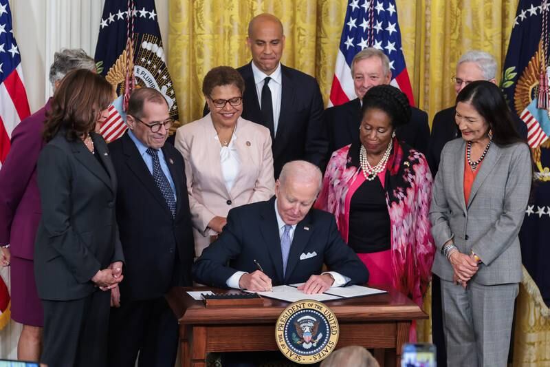 President Joe Biden signs a historic executive order to advance effective, accountable policing and strengthen public safety in May 2022. EPA