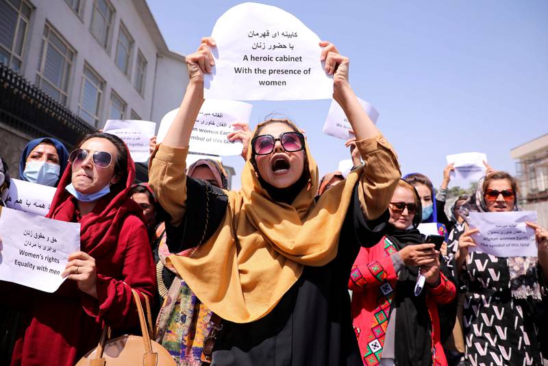 Afghan women's rights defenders and civil activists protest to call on the Taliban for the preservation of their achievements and education, in front of the presidential palace in Kabul on September 3, 2021. Reuters