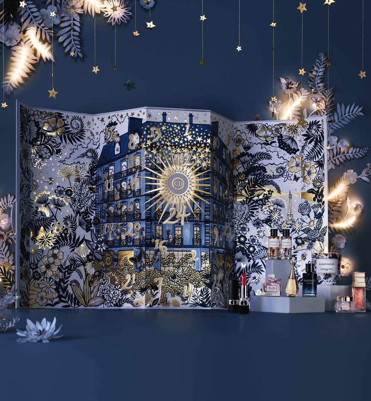 This beautifully designed gold and blue calendar opens up to reveal and array of luxurious Dior products. Photo: Dior