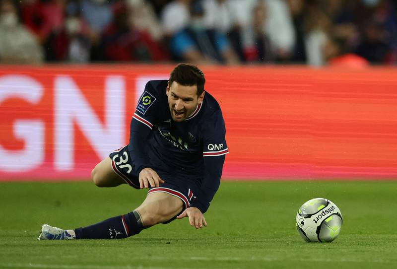 Lionel Messi takes a tumble. Reuters