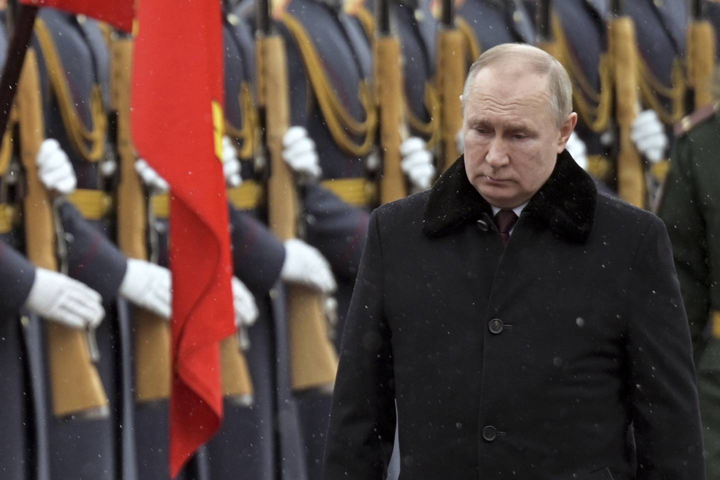 Russian President Vladimir Putin attends a wreath-laying ceremony at the Tomb of the Unknown Soldier during 'Defender of the Fatherland Day' in Moscow on Wednesday. AP