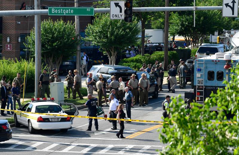 He said he was hiding under his desk along with other newspaper employees when the shooter stopped firing, the Capital Gazette reported on its website. Susan Walsh / AP Photo