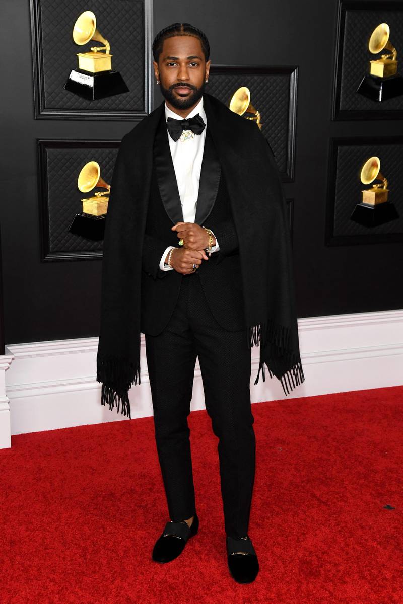 Rapper Big Sean, who arrived with girlfriend Jhene Aiko, in a classic black tuxedo by Zegna. EPA