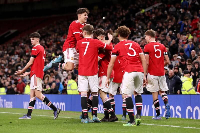 Alejandro Garnacho of Manchester United celebrates with teammates after scoring in the FA Youth Cup semi-final against Wolverhampton Wanderers at Old Trafford on March 9, 2022. Getty