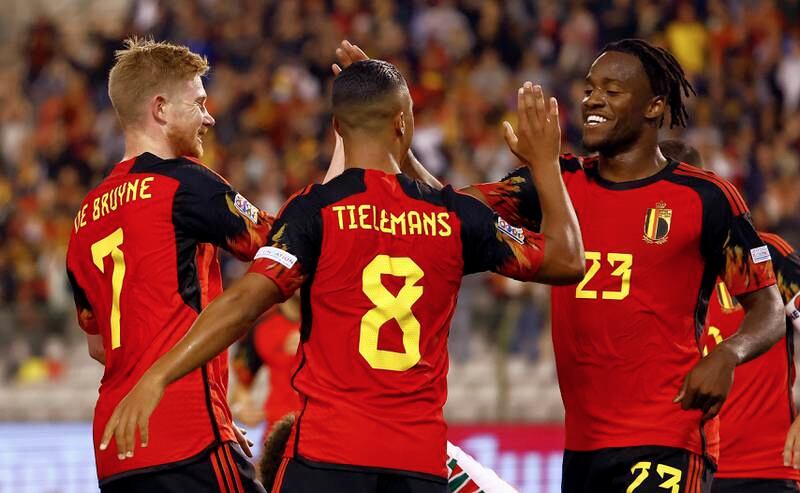Belgium's Michy Batshuayi, right, celebrates with teammates Kevin De Bruyne and Youri Tielemans after scoring to make it 2-0 against Wales. EPA 