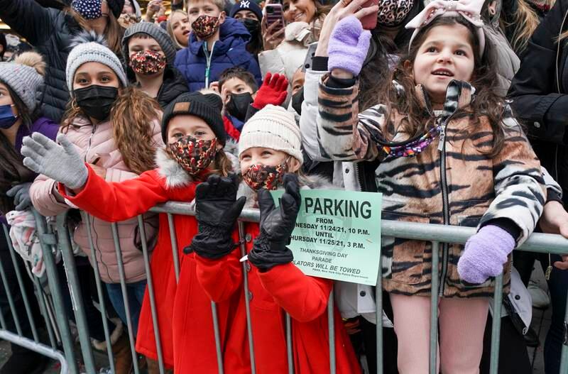 Children wave to Santa Claus. EPA