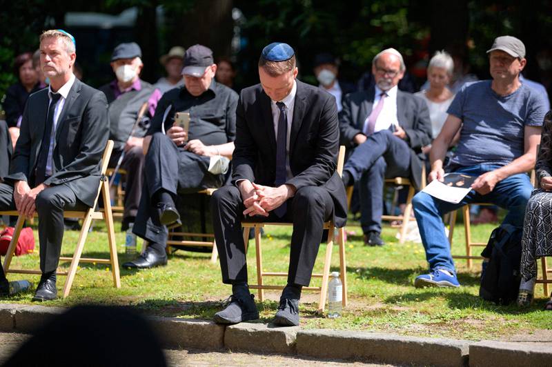 Anti-semitism commissioner Stefan Hensel (C) at the funeral service of Esther Bejarano, who survived the Nazi camp Auschwitz-Birkenau. Azhar Qayum, chief of Mend, is accused of expressing anti-Semitism in a social media post. AFP
