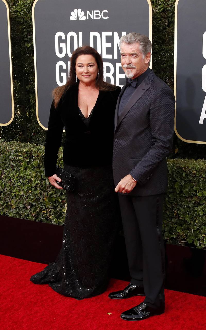 Pierce Brosnan, wearing Giorgio Armani, and Keely Shaye Smith arrive at the 77th annual Golden Globe Awards at the Beverly Hilton Hotel on January 5, 2020. EPA